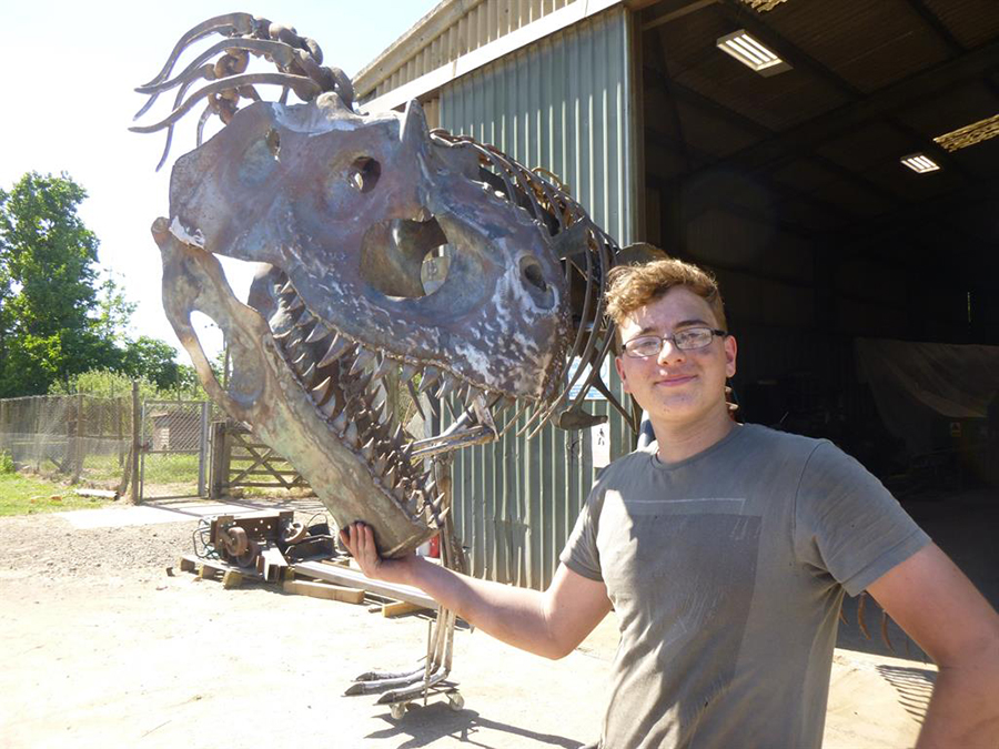 Pupil’s pet: William with his completed allosaurus