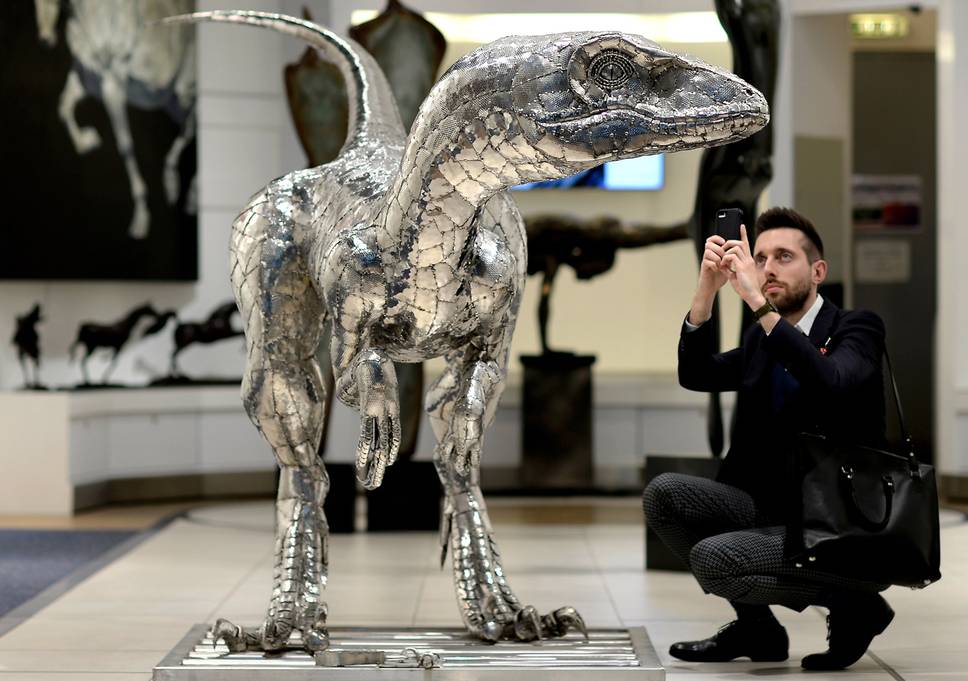 Prehistoric crowd-pleaser: The Velociraptor sculpture on display at T5 Gallery London Heathrow David Dyson