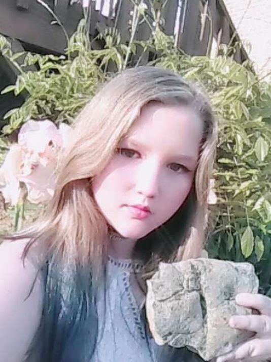 Ryleigh Taylor, 11, poses with the fossil she discovered. (Photo: Tammy Taylor)