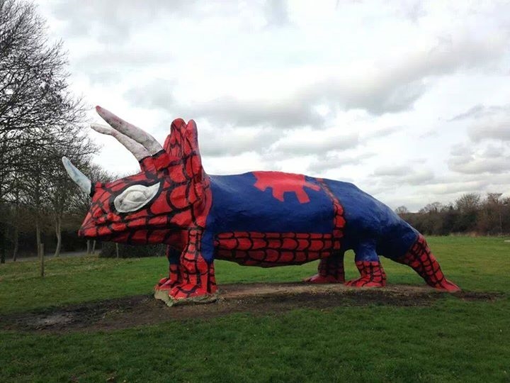 Someone has painted the local dinosaur statue like Spiderman. ~2m tall.