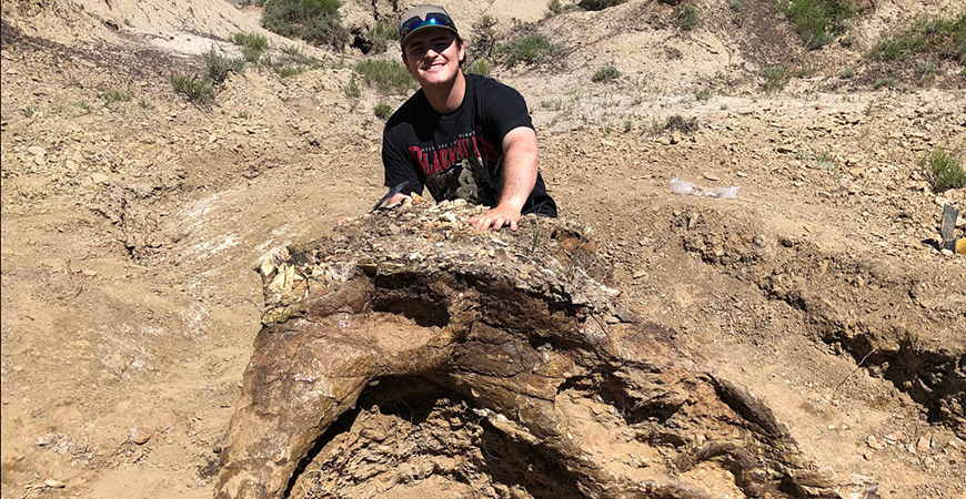 Harrison Duran, a fifth-year biology student, discovered a Triceratops skull during a paleontology dig in North Dakota.